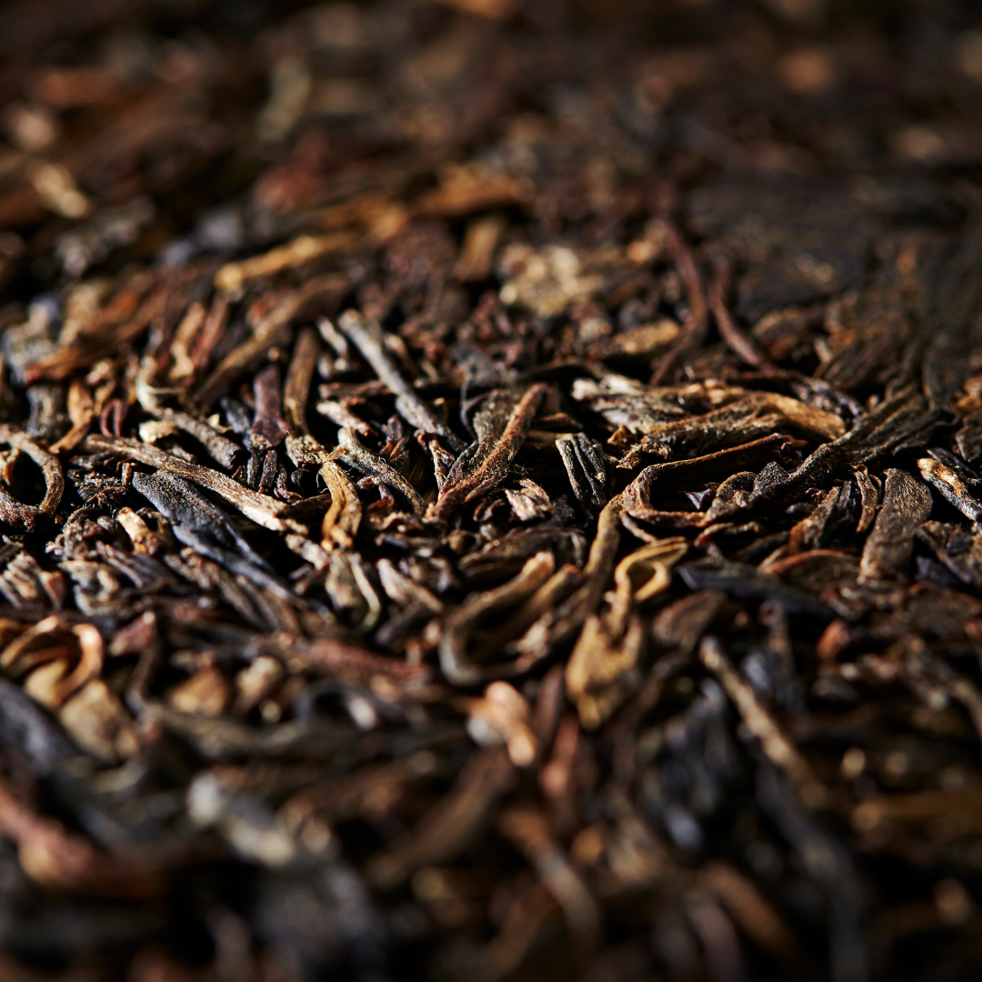 Loose leaf Pu-Erh Tea – dark fermented Yunnan tea leaves with rich earthy aroma and smooth taste