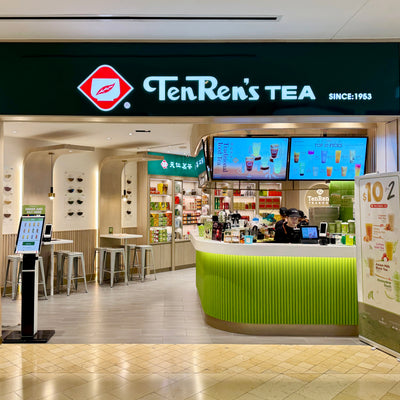 TenRens Tea storefront with digital menu boards and counter service area